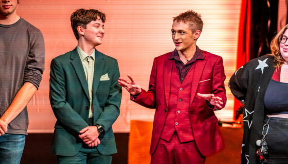 Pictured is the host and producer of Talking Reelish, as they speak to the audience.