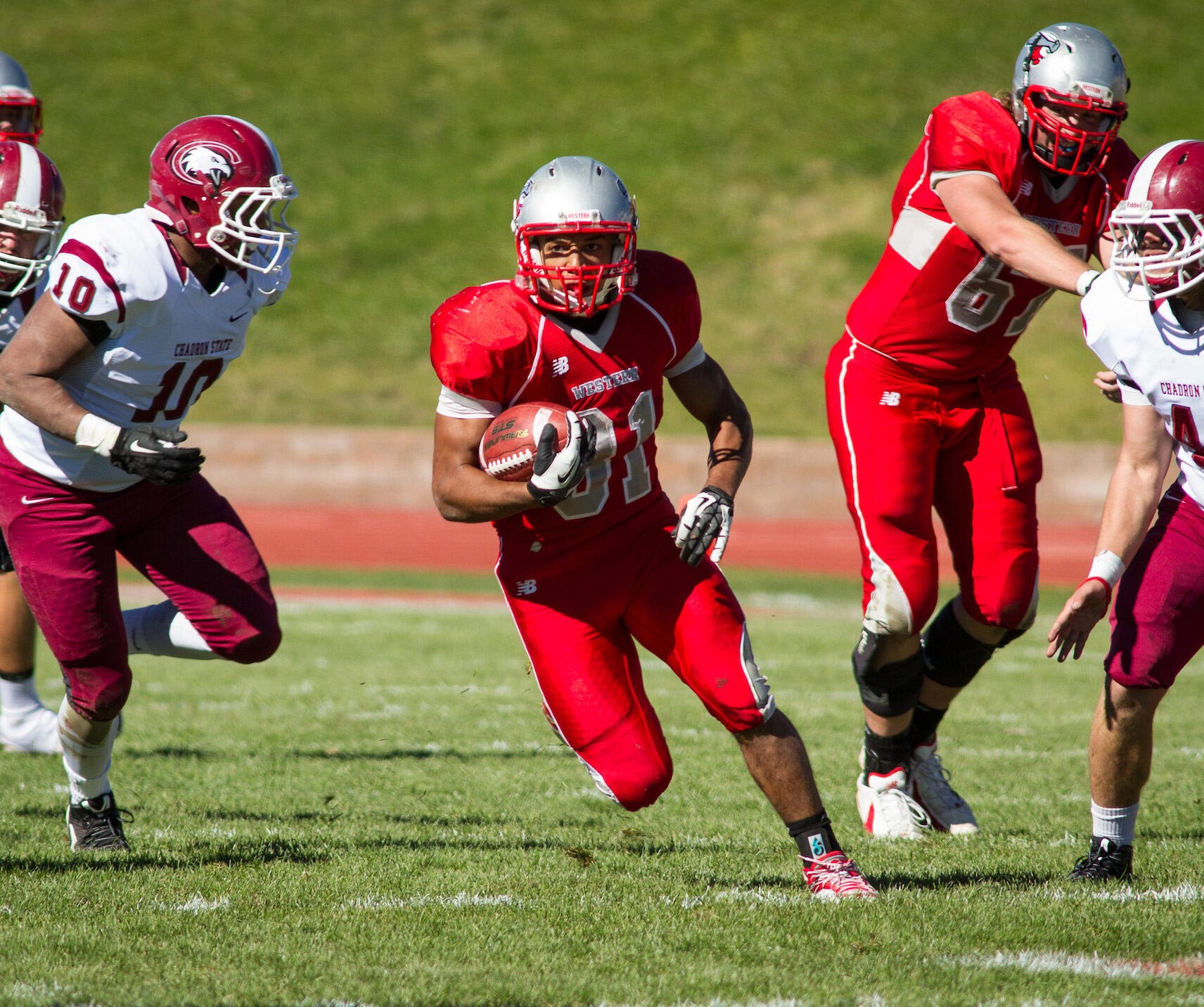 Action on the field during the homecoming football game at Mountaineer Stadium.
