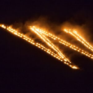 The lighting of the W on Tenderfoot Mountain during the Aspinall-Wilson Center Kickoff for Homecoming Weekend.