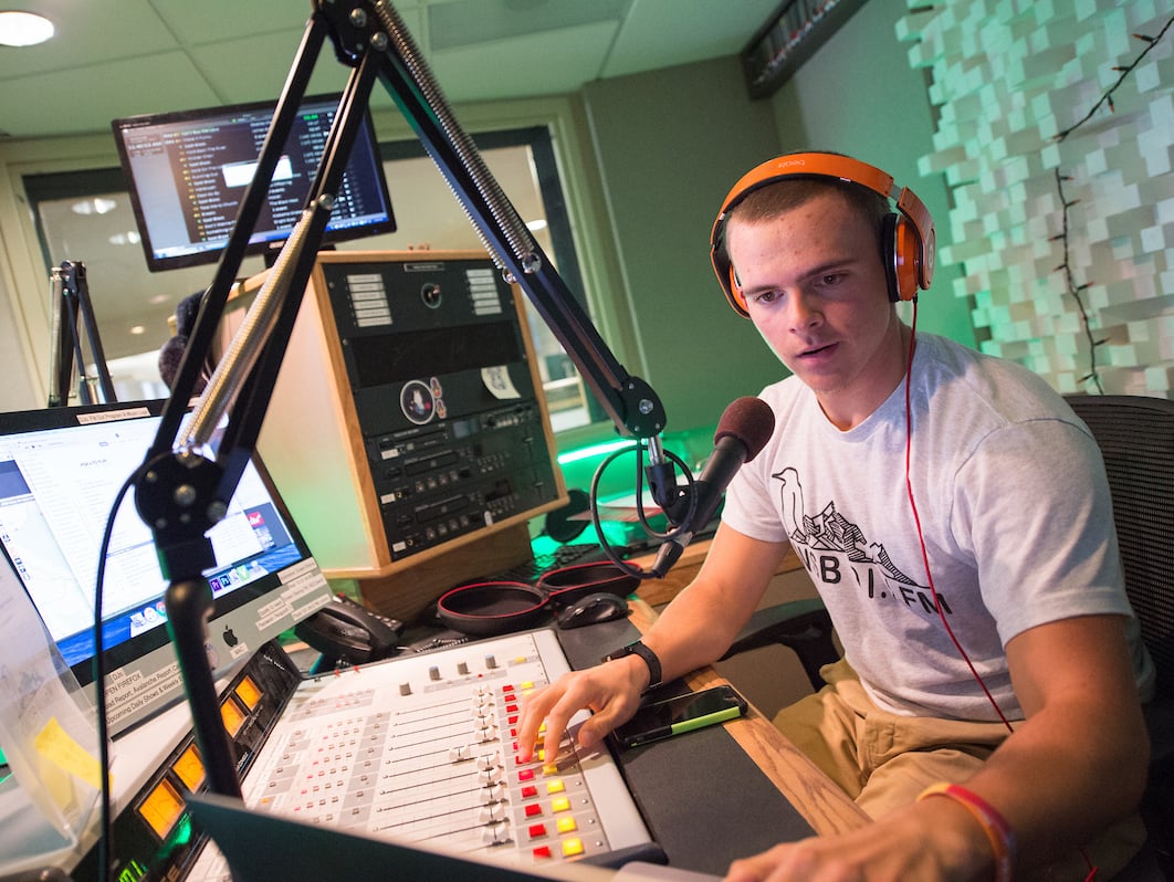 A student DJ's for KWSB, Western's in-house, student-run radio show.