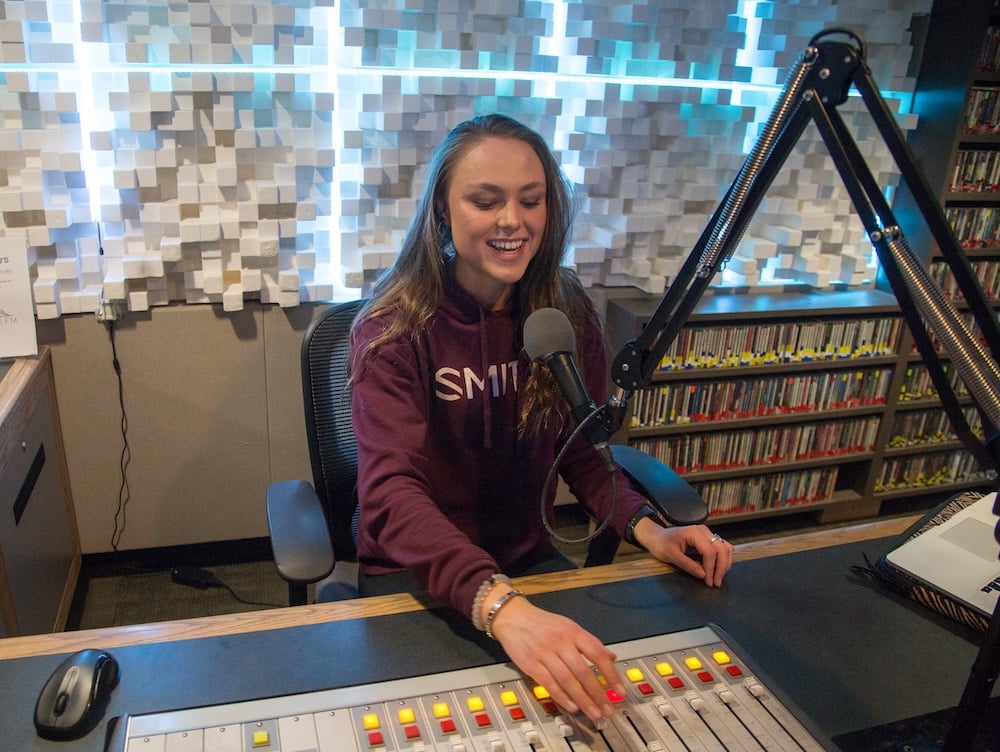 Kat Seibert talks in the microphone at kwsb.