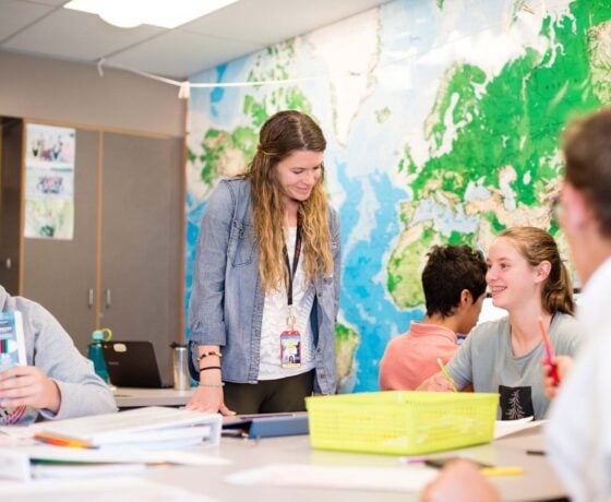 Taylor Martin, doing her student teaching at Gunnison High School, checking in a a group of students.