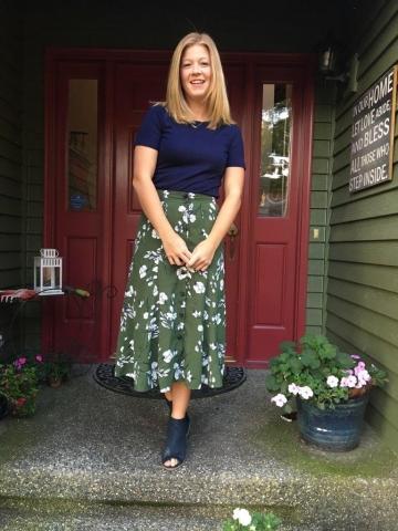 Jessica Miller standing in doorway of home