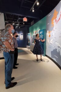 Sarah presenting at a museum