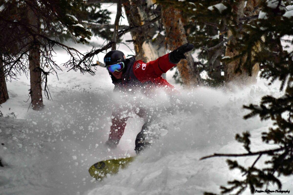 student snowboarding