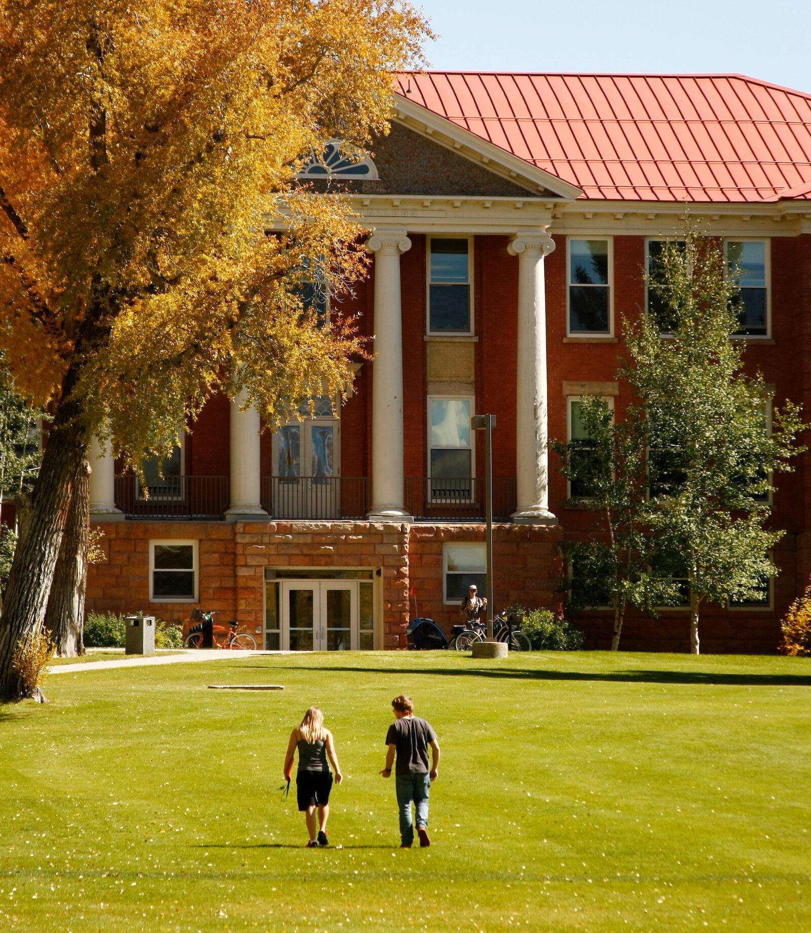 Students walking toward Taylor Hall