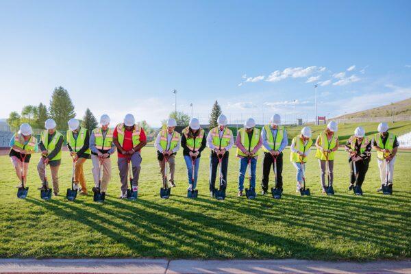 Leaders and builders breaking ground at building site