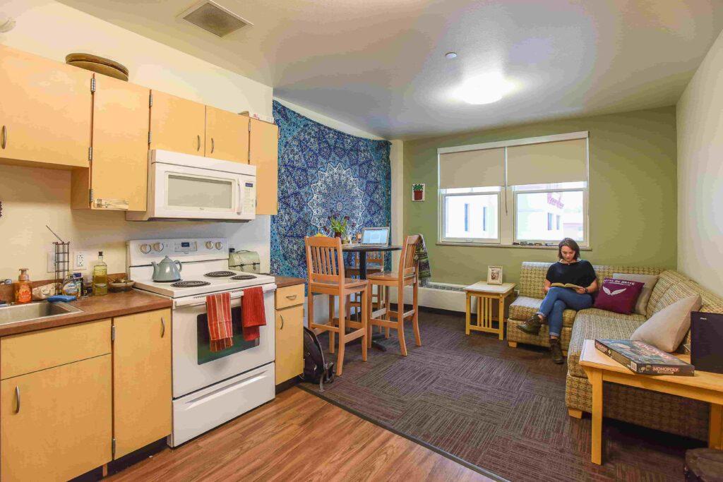 student sitting in dorm room