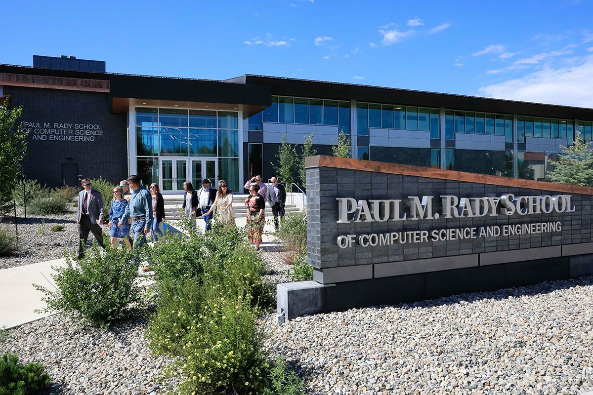 Lawmakers outside of Paul M. Rady School of Computer Science and Engineering