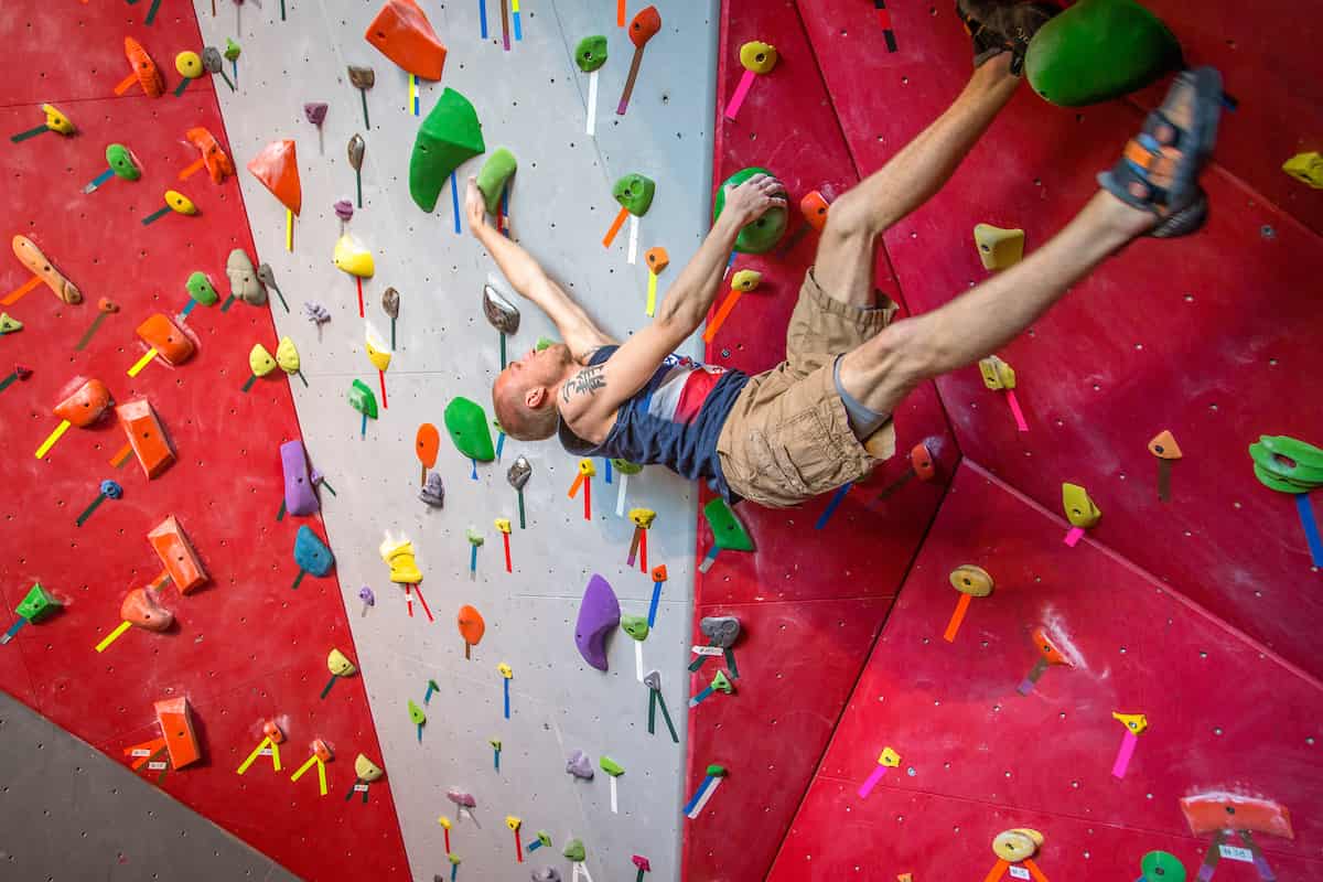 Colleges with rock climbing teams: student bouldering indoors