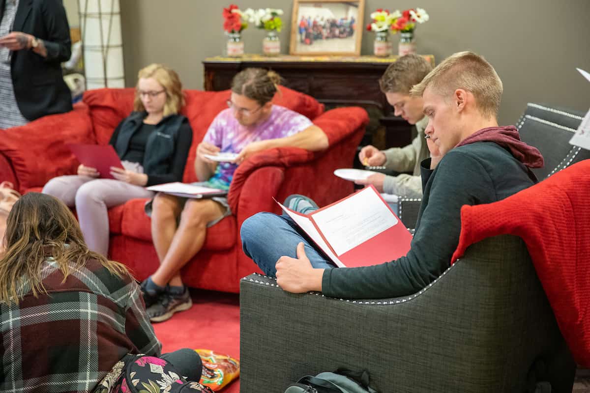 Colleges with accelerated master's programs: creative writing students reading an excerpt of writing