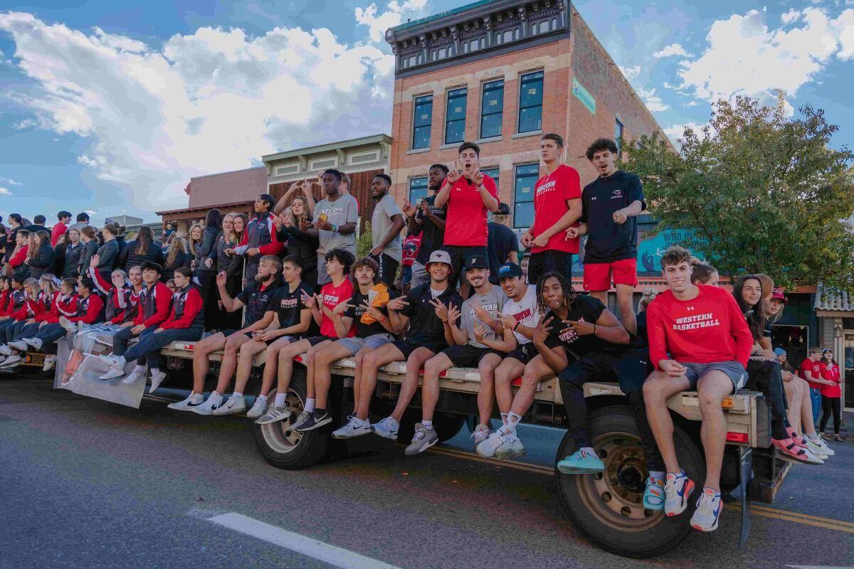 Western students on a float in main street homecoming parade