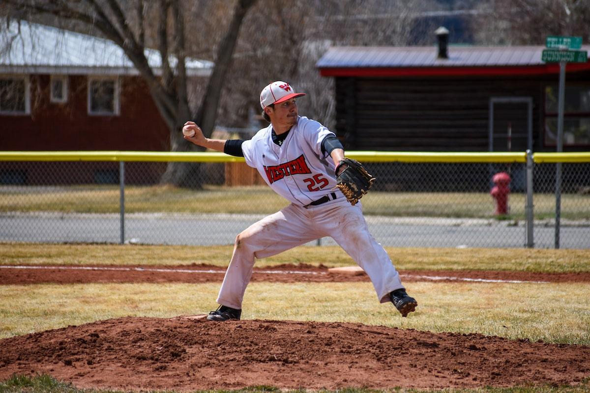 club sports: baseball player pitching