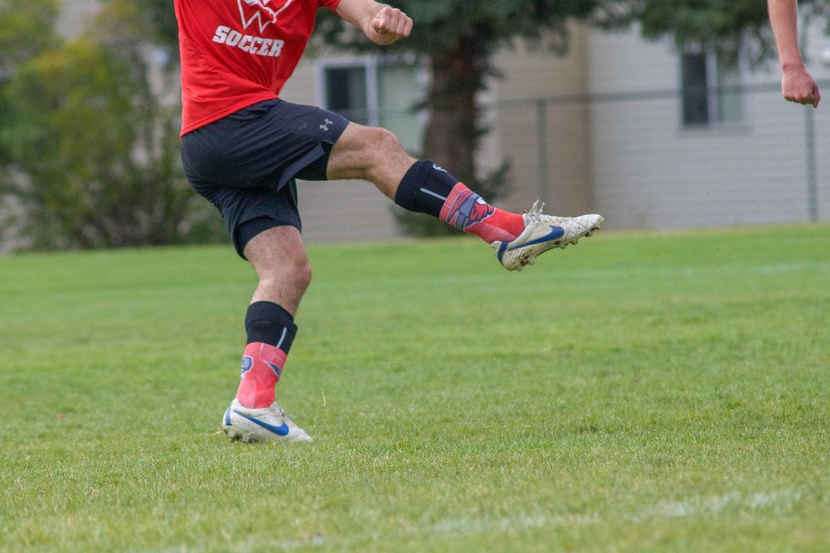 club sports student playing soccer