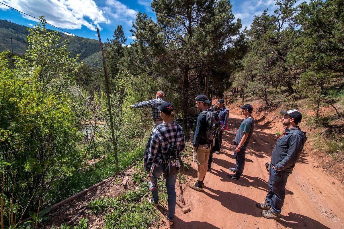 colleges with unique majors: students on hike for outdoors class