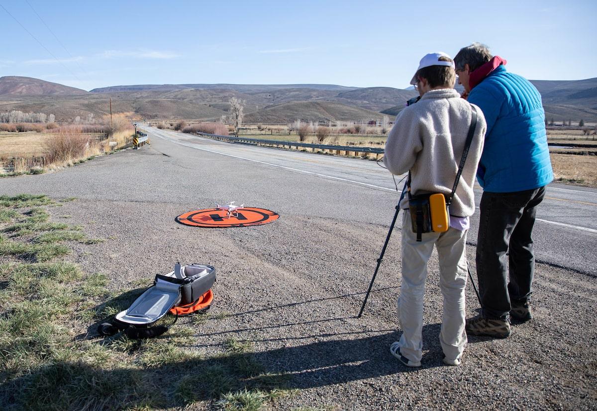 Best colleges with small class sizes: Professor showing student how to use a drone