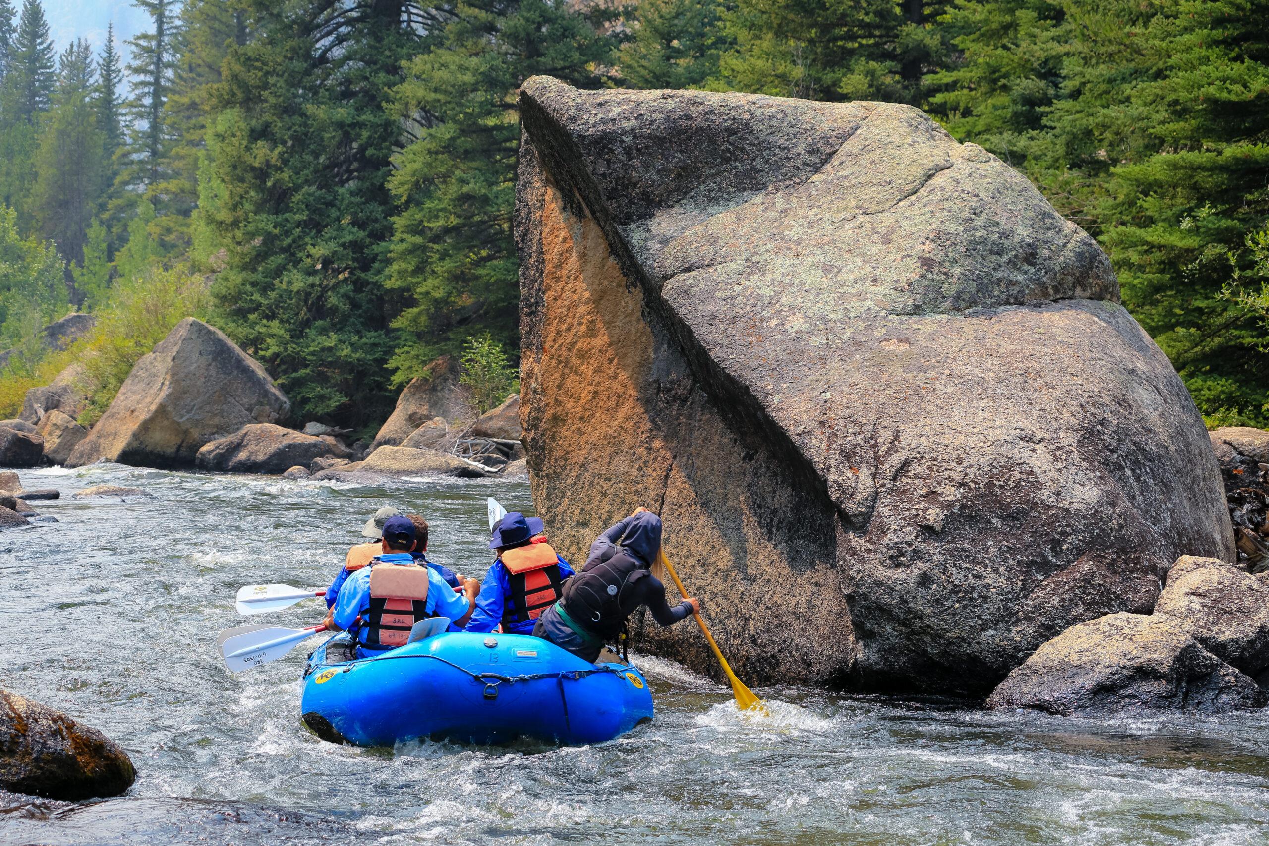 A group of students whitewater raft on the Taylor River