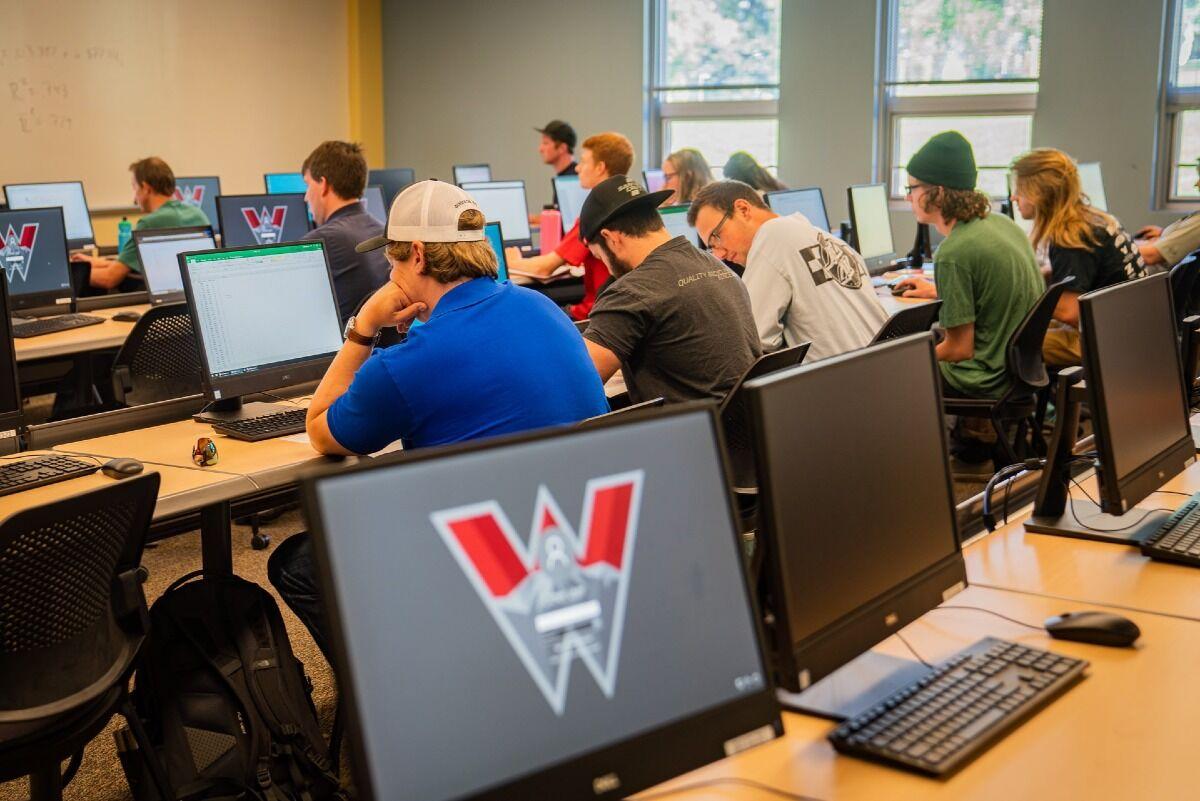 students sitting in a computer lab