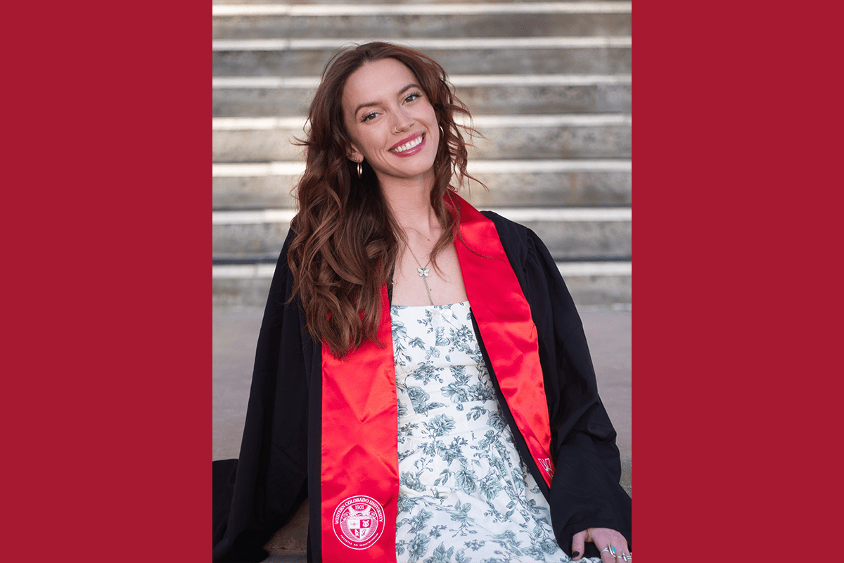 A headshot of Shelbi in her graduation gown.