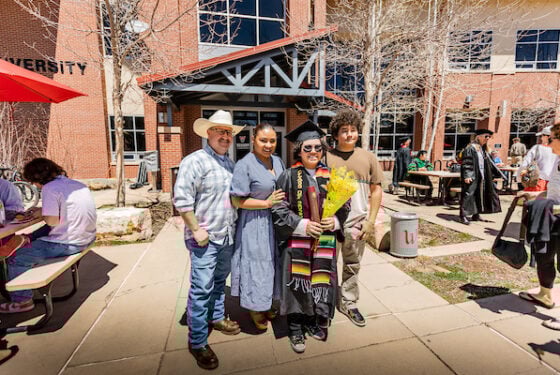 The family smiles during the family reception commencement in 2025.
