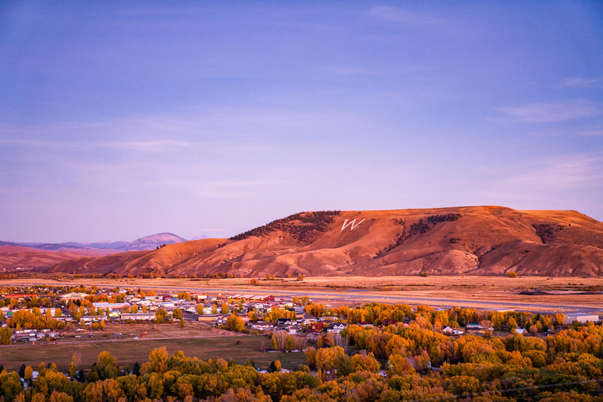 W Mountain and the town of Gunnison photographed just after sunset on a fall evening.