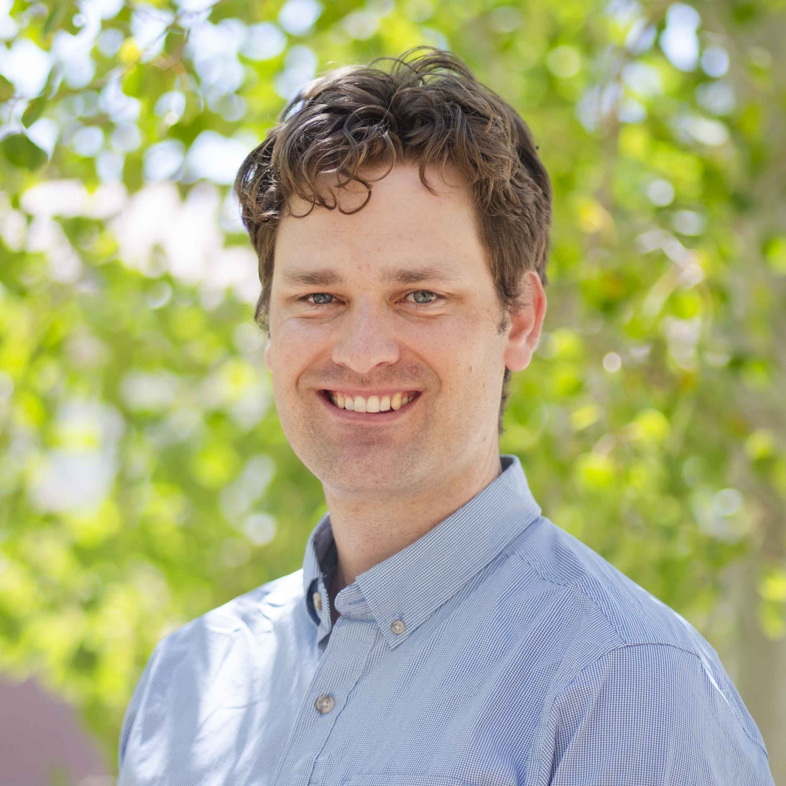 Headshot of Alex Alleman.