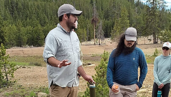 A man teaches about the importance of biochar.