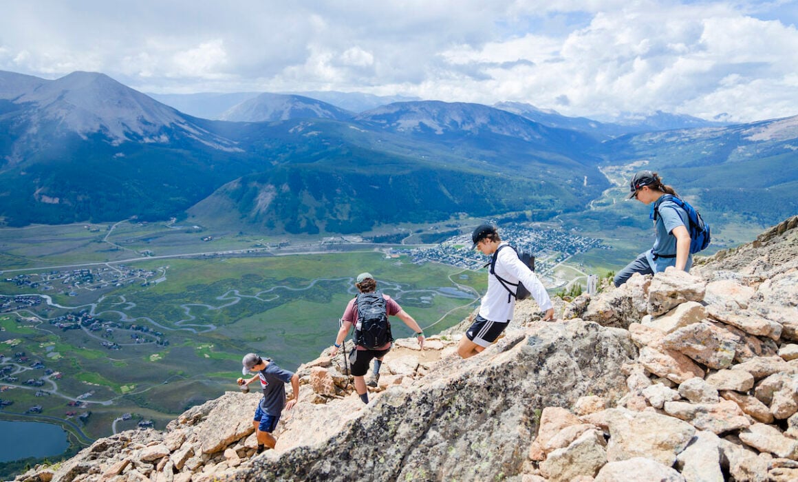 Students descend Mount Crested Butte on University Day.