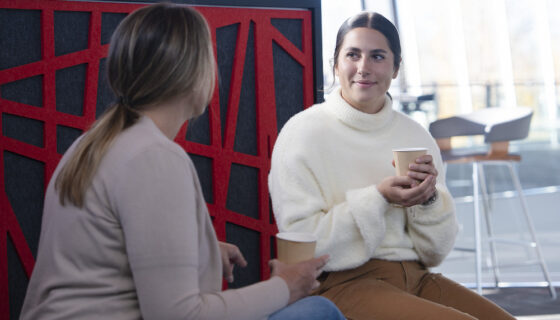 A student talks with an employer during a speed networking session for the Rady Career Fair.
