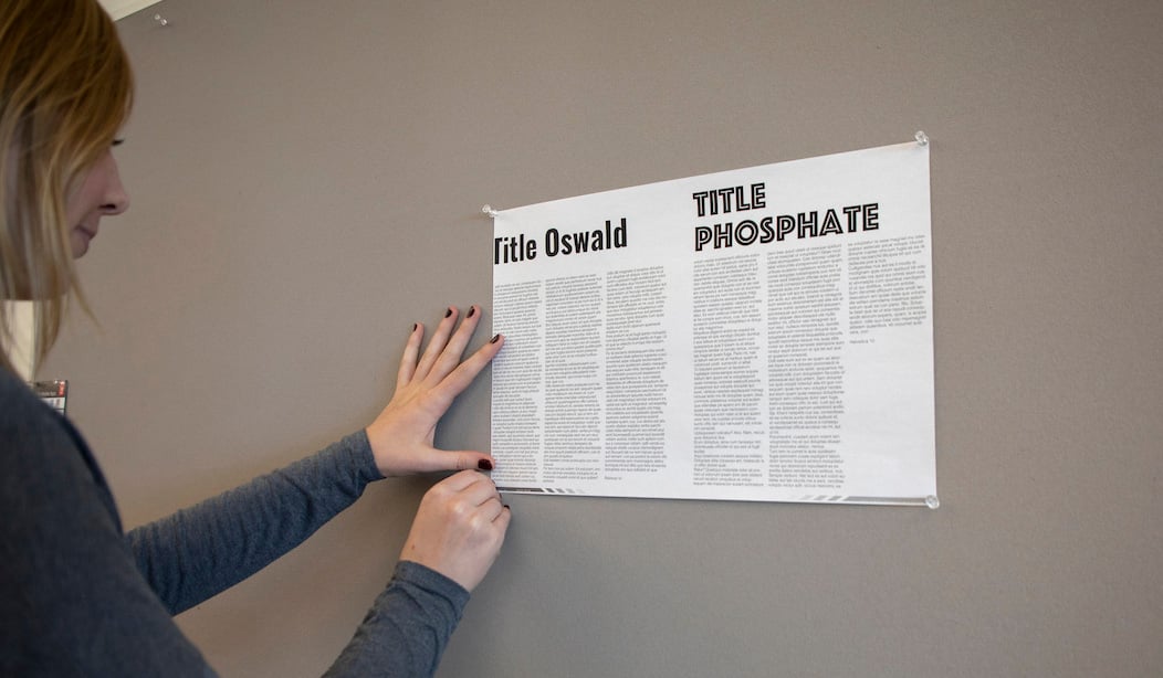 Kathleen Kasel hangs her idea for the type in Pathfinder Magazine.