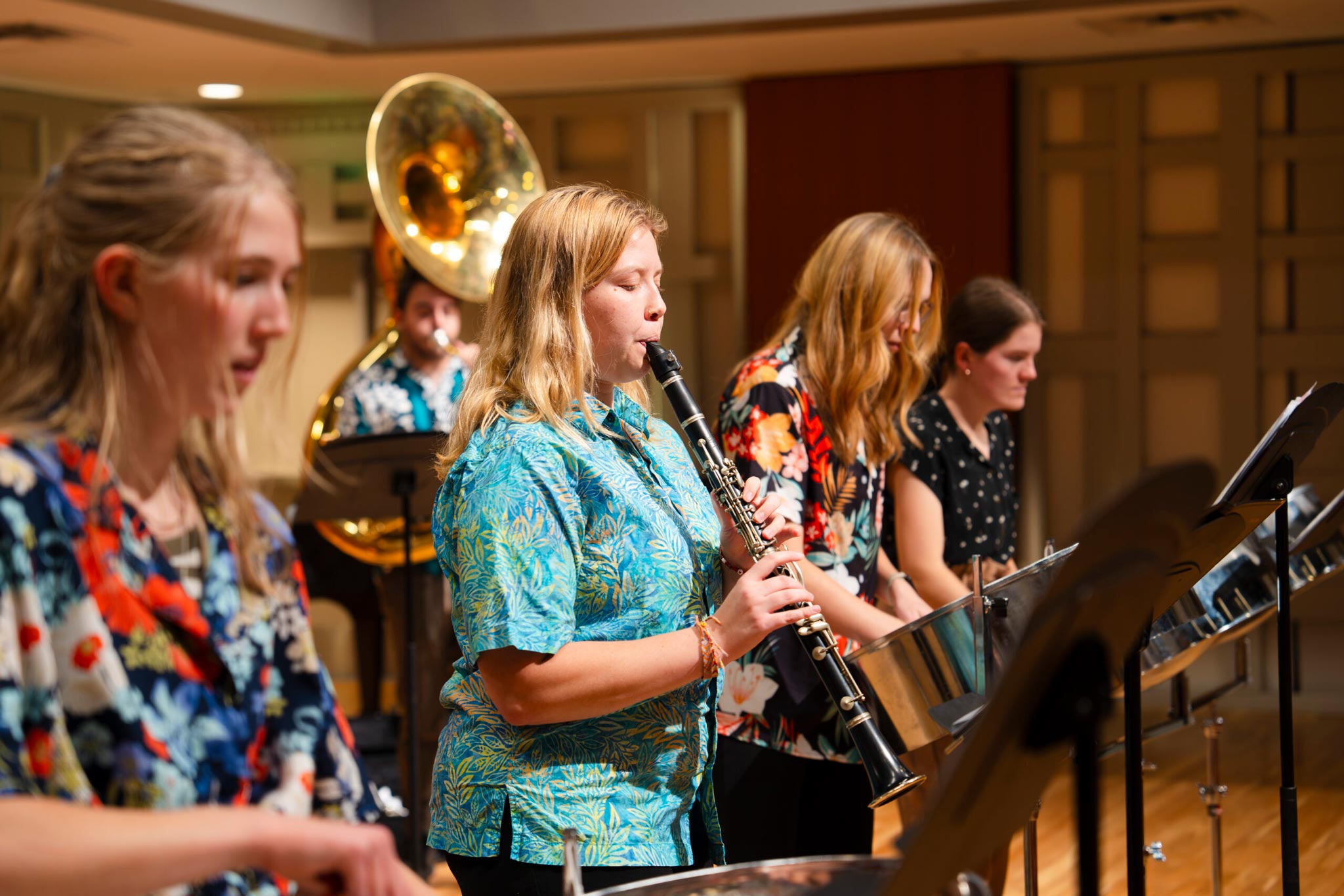 A student plays the clarinet during a steel band practice in the Kincaid Concert Hall.