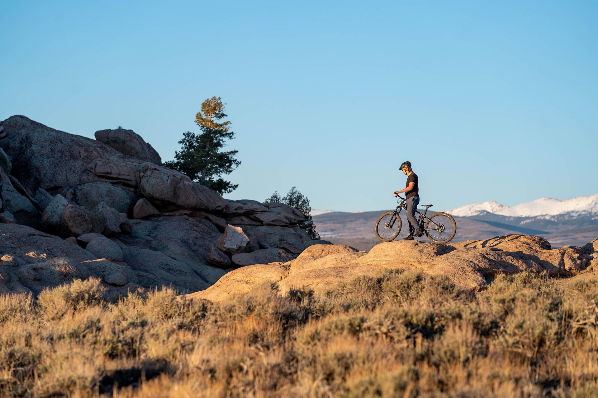 Student mountain bikes in the newly opened Hartman Rocks