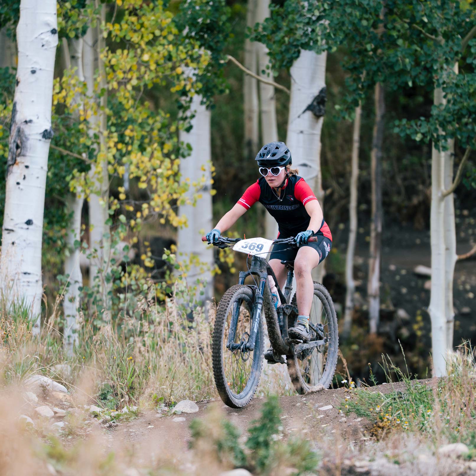 Photo of a Western athlete during the women's short track cross country bike race at Crested Butte Mountain Resort.