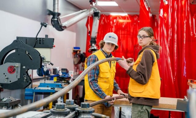Mechanical Engineering students create a rail for Rail Jam in the Maker Space in the Rady Building.