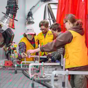 Mechanical Engineering students create a rail with their professor for Rail Jam in the Maker Space in the Rady Building.