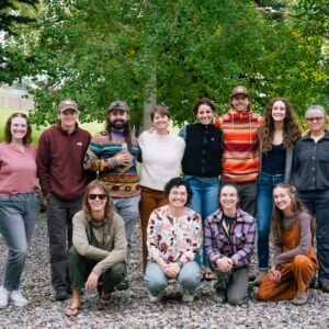 Group photo of students from various cohorts, faculty, and support staff of the NSF EMPLOYS program outside near the north patio of the Clark Family School of Environment & Sustainability.