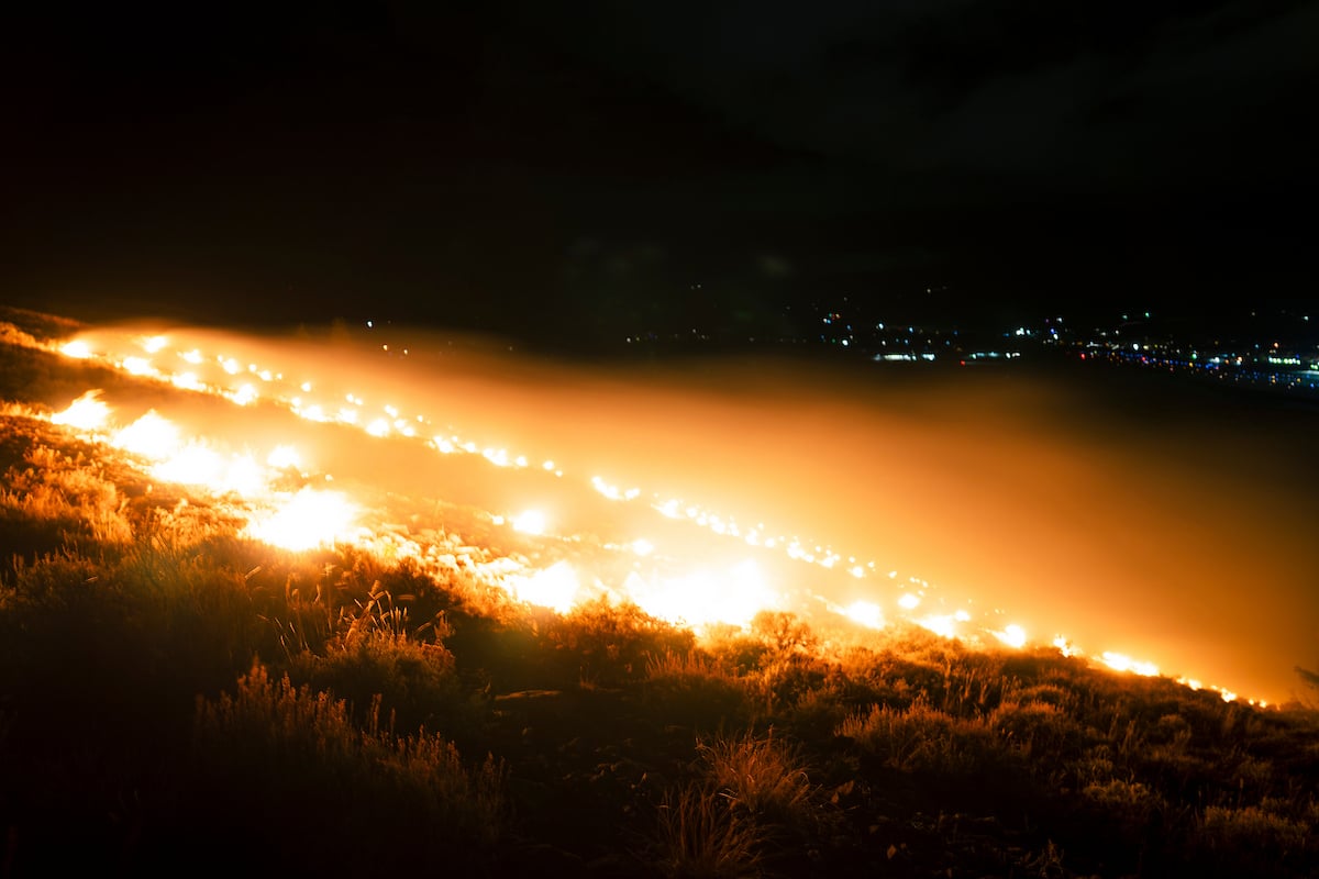 Burning W on the top corner on W Mountain.