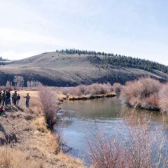 MEM alum, Brenan Bloyd, leads a stream resoration workshop next to Tomichi Creek on the Coldharbour ranch for the Headwaters 2025 Conference.