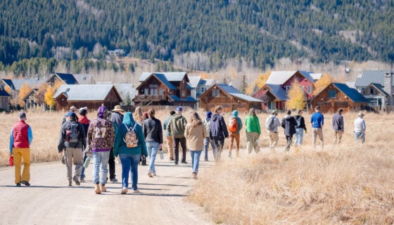 Students walking in a group through Verzuh Ranch