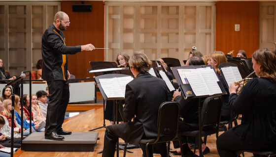 Dr. Brett Keating conducts the WCU symphonic band in Kincaid Hall