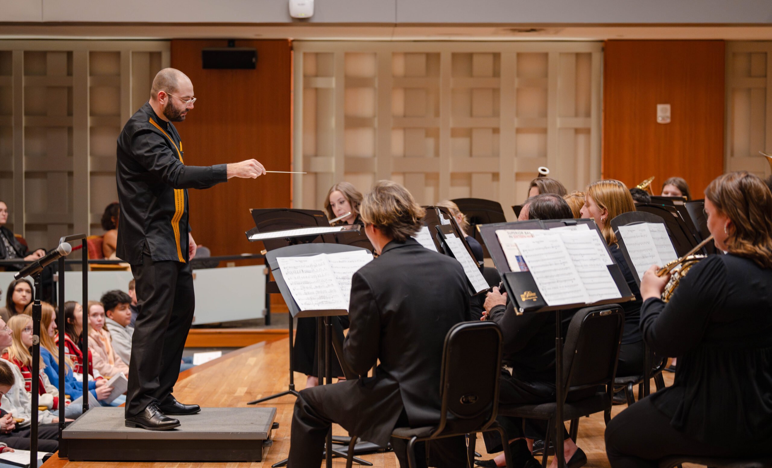 Dr. Brett Keating conducts the WCU symphonic band in Kincaid Hall