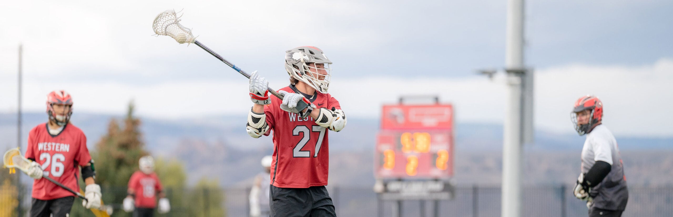 Current western player #27 looks to throw the ball to a teammate