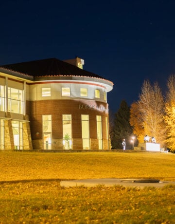The Borick Business glows at blue hour.
