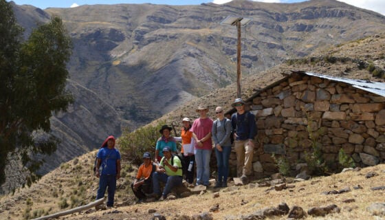 Students and other participants in Light Up The World post for a group photo on site of one of their projects in Peru.