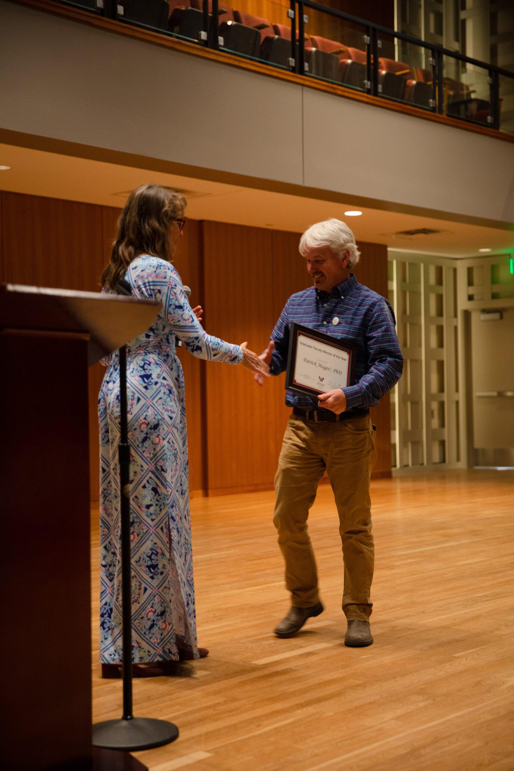 Western Faculty Member, Grad Students Receive Distinguished Achievement Award