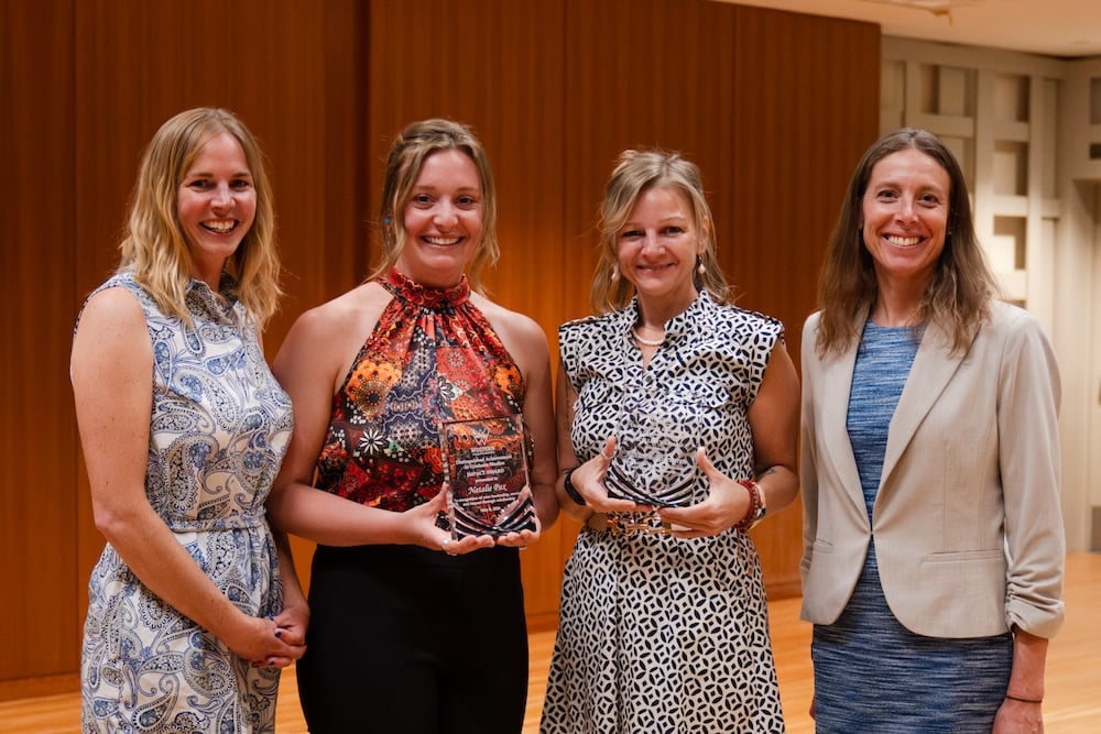 Dr. Kate Clark, Natalie Pax, Autumn Rosengren, and Mandi Leigh pose for a group photo at the 2026 Distinguished Achievement in Graduate Studies ceremony.