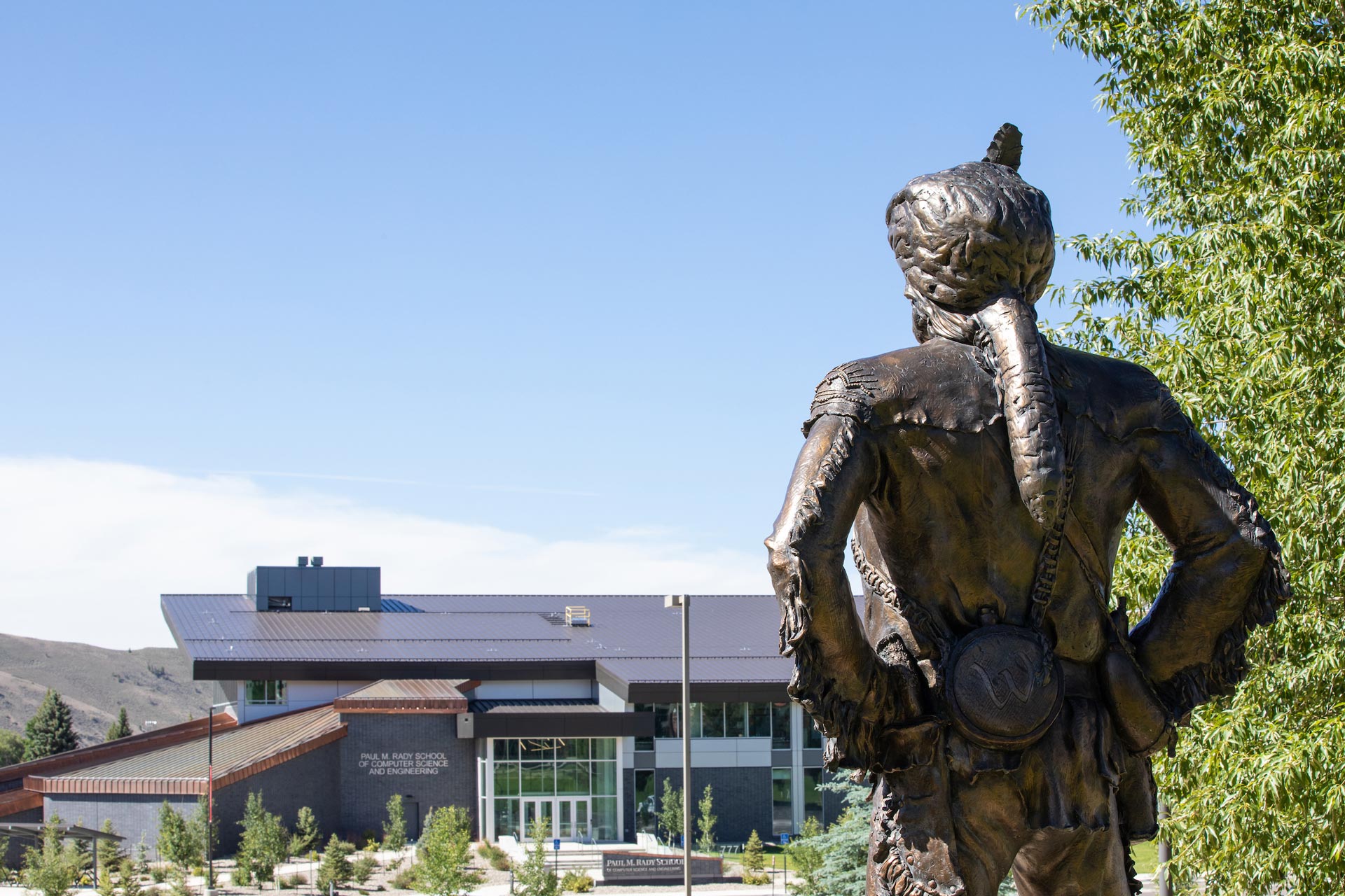 A photo of the back of the Mad Jack statue looking out at the Rady Building.