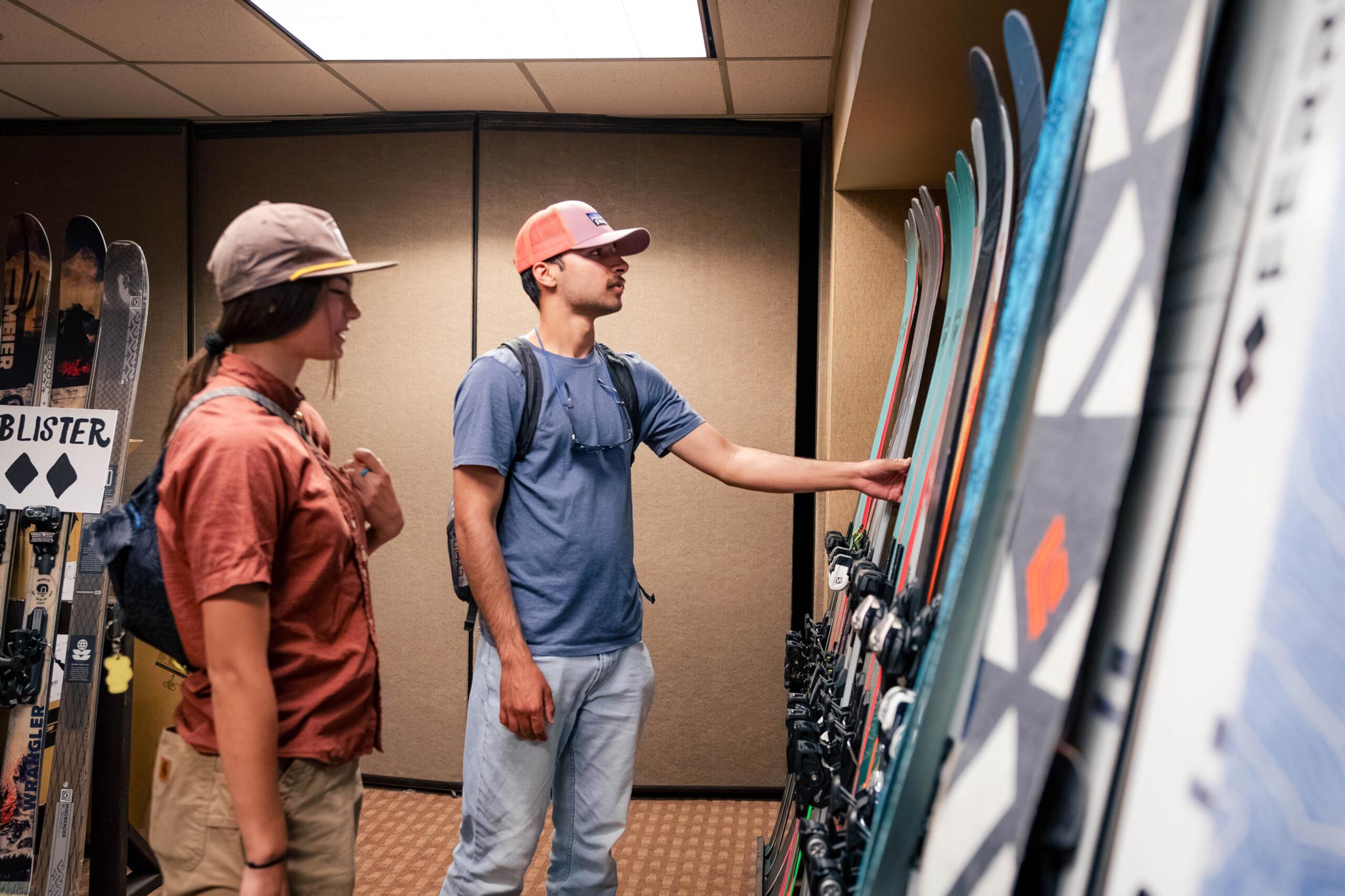 Outdoor Industry MBA students look at skis in the Blister Review show room