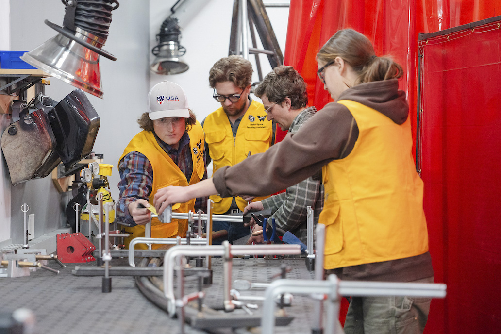 Mechanical Engineering students create a rail with their professor for Rail Jam in the Maker Space in the Rady Building.