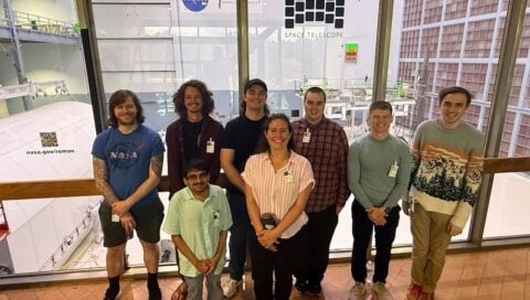 Students pose with Dr. Suzanne Taylor at NASA.